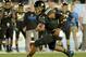 PASADENA, CA - NOVEMBER 15: Brett Hundley #17 of the UCLA Bruins scrambles for a first down during the first quarter against the Washington Huskies at Rose Bowl on November 15, 2013 in Pasadena, California. (Photo by Harry How/Getty Images)