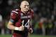 South Carolina quarterback Connor Shaw runs on the field before the first half of an NCAA college football game against Clemson on Saturday, Nov. 30, 2013, in Columbia, S.C. (AP Photo/Rainier Ehrhardt)