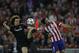 Chelsea's David Luiz, left, in action with Atletico's Diego Costa during the Champions League semifinal first leg soccer match between Atletico Madrid and Chelsea at the Vicente Calderon stadium in Madrid, Spain, Tuesday, April 22, 2014. (AP Photo/Gabriel Pecot)