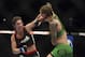 Apr 26, 2014; Baltimore, MD, USA; Bethe Correia (left) lands a head shot on Jessamyn Duke during the second round in UFC 172 at Baltimore Arena. Correia defeated Duke by judges decision. Mandatory Credit: Tommy Gilligan-USA TODAY Sports