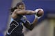Louisiana State linebacker Lamin Barrow runs a drill at the NFL football scouting combine in Indianapolis, Monday, Feb. 24, 2014. (AP Photo/Michael Conroy)