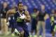 Baylor running back Lache Seastrunk runs a drill at the NFL football scouting combine in Indianapolis, Sunday, Feb. 23, 2014. (AP Photo/Michael Conroy)