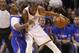 Oklahoma City Thunder forward Kevin Durant, right, drives against Los Angeles Clippers guard Chris Paul, left, in the second quarter of Game 1 of the Western Conference semifinal NBA basketball playoff series in Oklahoma City, Monday, May 5, 2014. (AP Photo/Sue Ogrocki)