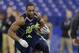 Boston College running back Andre Williams runs a drill at the NFL football scouting combine in Indianapolis, Sunday, Feb. 23, 2014. (AP Photo/Michael Conroy)