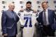 Dallas Cowboys draft pick Zach Martin, center, poses for photos with team owner Jerry Jones and head coach Jason Garrett at Valley Ranch in Irving, Texas, Saturday, May 10, 2014. The Cowboys took Martin with the 16th pick in the first round of the NFL draft. (AP Photo/LM Otero)