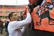 Cleveland Browns cornerback Joe Haden signs autographs for fans before an NFL football game against the Jacksonville Jaguars Sunday, Dec. 1, 2013, in Cleveland. (AP Photo/Tony Dejak)