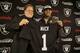 Oakland Raiders first-round draft choice Khalil Mack, right, poses with general manager Reggie McKenzie, left, following a news conference at the team's NFL football headquarters on Friday, May 9, 2014, in Alameda, Calif. Mack, a linebacker, played for Buffalo last season. (AP Photo/Eric Risberg)