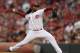Cincinnati Reds starting pitcher Johnny Cueto throws against the Colorado Rockies in the third inning of a baseball game, Friday, May 9, 2014, in Cincinnati. (AP Photo/Al Behrman)