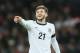 England's Adam Lallana gestures to his teammates during the international friendly soccer match between England and Denmark at Wembley stadium in London Wednesday, March 5, 2014. (AP Photo/Alastair Grant)