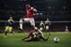 Arsenal's Alex Oxlade-Chamberlain, top, competes for the ball with Swansea City's Ashley Williams during the English Premier League soccer match between Arsenal and Swansea City at the Emirates Stadium in London, Tuesday, March 25, 2014. (AP Photo/Matt Dunham)