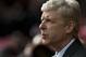 Arsenal's manager Arsene Wenger takes to the touchline before his team's English Premier League soccer match against Liverpool at Anfield Stadium, Liverpool, England, Saturday Feb. 8, 2014. (AP Photo/Jon Super)