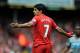 Liverpool's Luis Suarez during their English Premier League soccer match against Newcastle United at Anfield in Liverpool, England, Sunday May 11, 2014. (AP Photo/Clint Hughes)