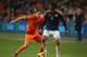 AMSTERDAM, NETHERLANDS - NOVEMBER 19: Juan Cuadrado of Colombia attempts to move away from Daley Blind during the friendly International match between the Netherlands and Colombia at the Amsterdam Arena on November 19, 2013 in Amsterdam, Netherlands. (Photo by Clive Brunskill/Getty Images)