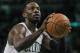Boston Celtics forward Jeff Green (8) shoots a free throw during the second half of an NBA basketball game in Boston, Wednesday, April 16, 2014. (AP Photo/Elise Amendola)