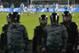 Riot police guard during the Russian Premier League Championship soccer match between Zenit and Dinamo Moscow at Petrovsky stadium in St.Petersburg, Russia, Saturday, April 28, 2012. (AP Photo/Dmitry Lovetsky)