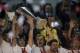 Sevilla's Ivan Rakitic holds up the trophy after winningthe Europa League soccer final between Sevilla and Benfica, at the Turin Juventus stadium in Turin, Italy, Wednesday, May 14, 2014. (AP Photo/Andrew Medichini)