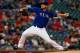 ARLINGTON, TX - MAY 08: Matt Harrison #54 of the Texas Rangers pitches against the Colorado Rockies in the top of the third inning at Globe Life Park in Arlington on May 8, 2014 in Arlington, Texas. (Photo by Tom Pennington/Getty Images)