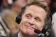TNT commentator and former Chicago Bulls and San Antonio Spurs guard Steve Kerr broadcasts courtside for Game 4 of an NBA basketball first-round playoff series between the Toronto Raptors and the Brooklyn Nets at the Barclays Center, Sunday, April 27, 2014, in New York. New York Knicks President Phil Jackson told reporters he interviewed Kerr for the vacant New York Knicks coaching position. (AP Photo/Kathy Willens)