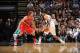 SAN ANTONIO, TX - MAY 14: Robin Lopez #42 of the Portland Trail Blazers defends against Tim Duncan #21 of the San Antonio Spurs in Game Five of the Western Conference Semifinals during the 2014 NBA Playoffs on May 14, 2014 at the AT&T Center in San Antonio, Texas. NOTE TO USER: User expressly acknowledges and agrees that, by downloading and/or using this Photograph, user is consenting to the terms and conditions of the Getty Images License Agreement. Mandatory Copyright Notice: Copyright 2013 NBAE (Photo by Garrett W. Ellwood/NBAE via Getty Images)