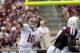 FILE - In this Sept. 14, 2013, file photo, Alabama quarterback AJ McCarron (10) throws a pass against Texas A&M during the second quarter of an NCAA college football game in College Station, Texas. McCarron was selected by the Cincinnati Bengals in the fifth round, 164th overall, in the 2014 NFL Draft on Saturday, May 10, 2014.(AP Photo/David J. Phillip)