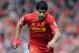 Liverpool's Luis Suarez during their English Premier League soccer match against Newcastle United at Anfield in Liverpool, England, Sunday May 11, 2014. (AP Photo/Clint Hughes)