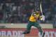 In this Friday, April 4, 2014 photo, South Africa's JP Duminy plays a shot during their ICC Twenty20 Cricket World Cup semi-final match against India in Dhaka, Bangladesh. (AP Photo/Aijaz Rahi)