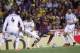 Barcelona's Neymar, 3rd left tries to get past Real's Sergio Ramos, left, Fabio Coentrao, centre and Xabi Alonso during the final of the Copa del Rey between FC Barcelona and Real Madrid at the Mestalla stadium in Valencia, Spain, Wednesday, April 16, 2014. (AP Photo/Alberto Saiz)