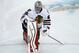 Chicago Blackhawks goalie Corey Crawford stretches during warmups before Game 4 of an NHL hockey second-round playoff series against the Minnesota Wild in St. Paul, Minn., Friday, May 9, 2014. (AP Photo/Ann Heisenfelt)