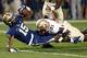 Pittsburgh wide receiver Devin Street (15) is tackled by Florida State defensive back Terrence Brooks (31) after making a catch in the first quarter of the NCAA college football game, Monday, Sept. 2, 2013, in Pittsburgh. (AP Photo/Keith Srakocic)