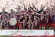 Munich's players celebrate with the trophy for winning the German Soccer Championships after the season's last match between FC Bayern Munich and VfB Stuttgart, in Munich, southern Germany, Saturday, May 10, 2014. (AP Photo/Matthias Schrader)