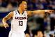 ARLINGTON, TX - APRIL 07: Shabazz Napier #13 of the Connecticut Huskies calls a play against the Kentucky Wildcats during the NCAA Men's Final Four Championship at AT&T Stadium on April 7, 2014 in Arlington, Texas. (Photo by Jamie Squire/Getty Images)