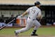 Chicago White Sox Jose Abreu throws his bat after hitting a single off Oakland Athletics' Drew Pomeranz in the fourth inning of a baseball game Tuesday, May 13, 2014, in Oakland, Calif. (AP Photo)