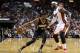 Indiana Pacers' Paul George (24) drives to the basket as Miami Heat's LeBron James (6) defends during the first half of an NBA basketball game, Friday, April 11, 2014, in Miami. (AP Photo/Lynne Sladky)