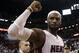 Miami Heat forward LeBron James celebrates their 96-94 win against the Brooklyn Nets during after Game 5 of a second-round NBA playoff basketball game in Miami, Wednesday, May 14, 2014. (AP Photo)