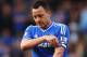 LONDON, ENGLAND - MAY 04: John Terry of Chelsea reacts during the Barclays Premier League match between Chelsea and Norwich City at Stamford Bridge on May 4, 2014 in London, England. (Photo by Clive Rose/Getty Images)