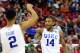 Mar 21, 2014; Raleigh, NC, USA; Duke Blue Devils guard Rasheed Sulaimon (14) celebrates with Duke Blue Devils guard Quinn Cook (2) against the Mercer Bears in the second half of a men's college basketball game during the second round of the 2014 NCAA Tournament at PNC Arena. Mandatory Credit: Bob Donnan-USA TODAY Sports