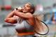 MADRID, SPAIN - MAY 07: Serena Williams of USA in action against Shuai Peng of China during day five of the Mutua Madrid Open tennis tournament at the Caja Magica on May 7, 2014 in Madrid, Spain. (Photo by Julian Finney/Getty Images)
