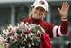 Rosie Napravnik celebrates after riding Untapable to victory during the 140th running of the Kentucky Oaks horse race at Churchill Downs Friday, May 2, 2014, in Louisville, Ky. (AP Photo/Garry Jones)