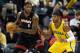 Dec 10, 2013; Indianapolis, IN, USA; Miami Heat guard LeBron James (6) is guarded by Indiana Pacers forward Paul George (24) at Bankers Life Fieldhouse. Indiana defeats Miami 90-84. Mandatory Credit: Brian Spurlock-USA TODAY Sports