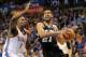 Apr 3, 2014; Oklahoma City, OK, USA; San Antonio Spurs forward Tim Duncan (21) drives to the basket against Oklahoma City Thunder center Kendrick Perkins (5) during the third quarter at Chesapeake Energy Arena. Mandatory Credit: Mark D. Smith-USA TODAY Sports