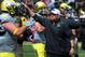 EUGENE, OR - MAY 3: Oregon Ducks head coach Mark Helfrich greets his players before the Spring game at Autzen Stadium on May 3, 2014 in Eugene, Oregon. (Photo by Steve Dykes/Getty Images)