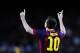 FC Barcelona's Lionel Messi, from Argentina, reacts after scoring during a Spanish La Liga soccer match against Celta Vigo at the Camp Nou stadium in Barcelona, Spain, Wednesday, March 26, 2014. (AP Photo/Manu Fernandez)