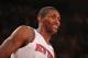 NEW YORK, NY - NOVEMBER 14: Metta World Peace #51 of the New York Knicks smiles during the game against the Houston Rockets during a game at Madison Square Garden in New York City on November 14, 2013. NOTE TO USER: User expressly acknowledges and agrees that, by downloading and or using this photograph, User is consenting to the terms and conditions of the Getty Images License Agreement. Mandatory Copyright Notice: Copyright 2013 NBAE (Photo by Nathaniel S. Butler/NBAE via Getty Images)