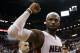 Miami Heat forward LeBron James celebrates their 96-94 win against the Brooklyn Nets during after Game 5 of a second-round NBA playoff basketball game in Miami, Wednesday, May 14, 2014. (AP Photo)