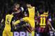 Atletico's Diego Costa, centre challenges for the ball with Barcelona's Daniel Alves, top left during a first leg quarterfinal Champions League soccer match between Barcelona and Atletico Madrid at the Camp Nou stadium in Barcelona, Spain, Tuesday April 1, 2014. (AP Photo/Manu Fernandez)