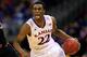 KANSAS CITY, MO - MARCH 13: Andrew Wiggins #22 of the Kansas Jayhawks drives upcourt as Marcus Smart #33 of the Oklahoma State Cowboys defends during the Big 12 Basketball Tournament quarterfinal game at Sprint Center on March 13, 2014 in Kansas City, Missouri. (Photo by Jamie Squire/Getty Images)