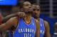 Oklahoma City Thunder forward Serge Ibaka, right, of Congo, puts his arm around forward Kevin Durant in the second half of Game 3 of the Western Conference semifinal NBA basketball playoff series against the Los Angeles Clippers, Friday, May 9, 2014, in Los Angeles. The Thunder won 118-112. (AP Photo/Mark J. Terrill)