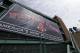 Fans enter Fenway Park before a baseball game between the Boston Red Sox and the Milwaukee Brewers in Boston, Friday, April 4, 2014. (AP Photo/Michael Dwyer)
