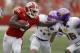 MADISON, WI - SEPTEMBER 07: Corey Clement #6 of the Wisconsin Badgers stiff arms Tevin McDermott #36 of the Tennessee Tech Golden Eagles while running upfield during the game at Camp Randall Stadium on September 07, 2013 in Madison, Wisconsin. (Photo by Mike McGinnis/Getty Images)