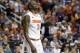 Syracuse's Jerami Grant (3) walks off the court after their loss to North Carolina State in a quarterfinal NCAA college basketball game at the Atlantic Coast Conference tournament in Greensboro, N.C., Friday, March 14, 2014. North Carolina State won 66-63. (AP Photo/Gerry Broome)